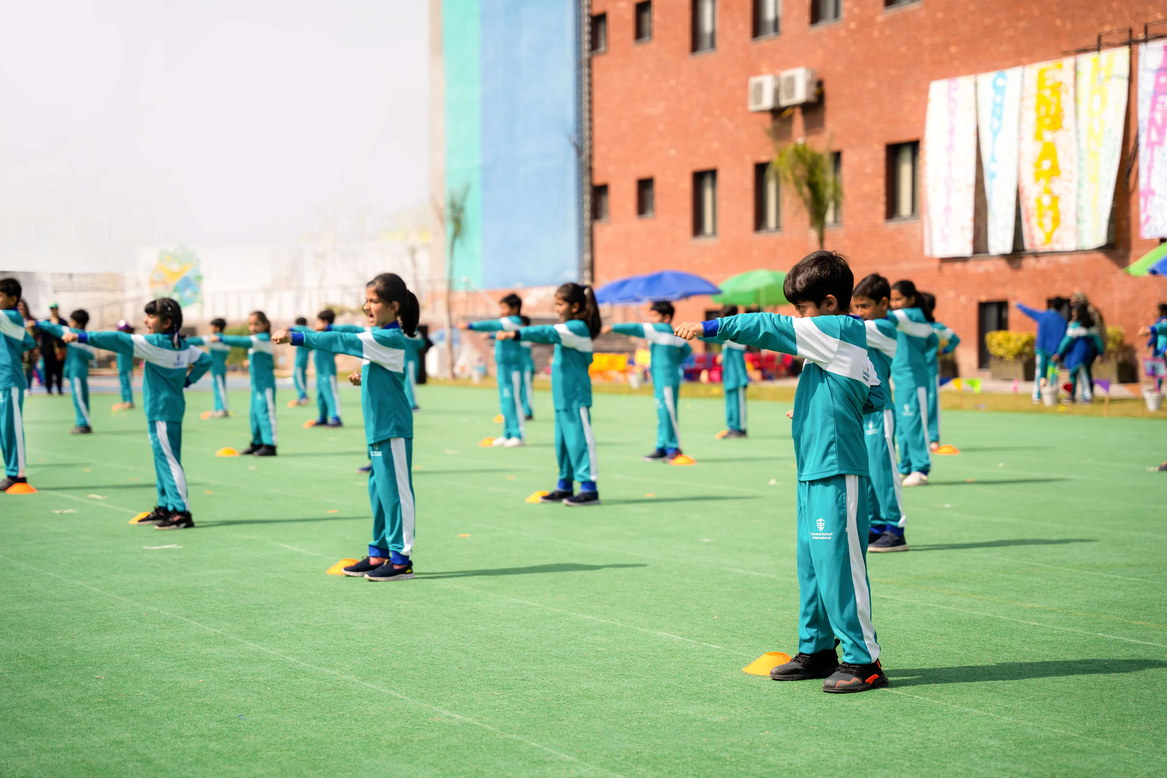 Students taking part in an Extended Learning Programme club activity outdoors.