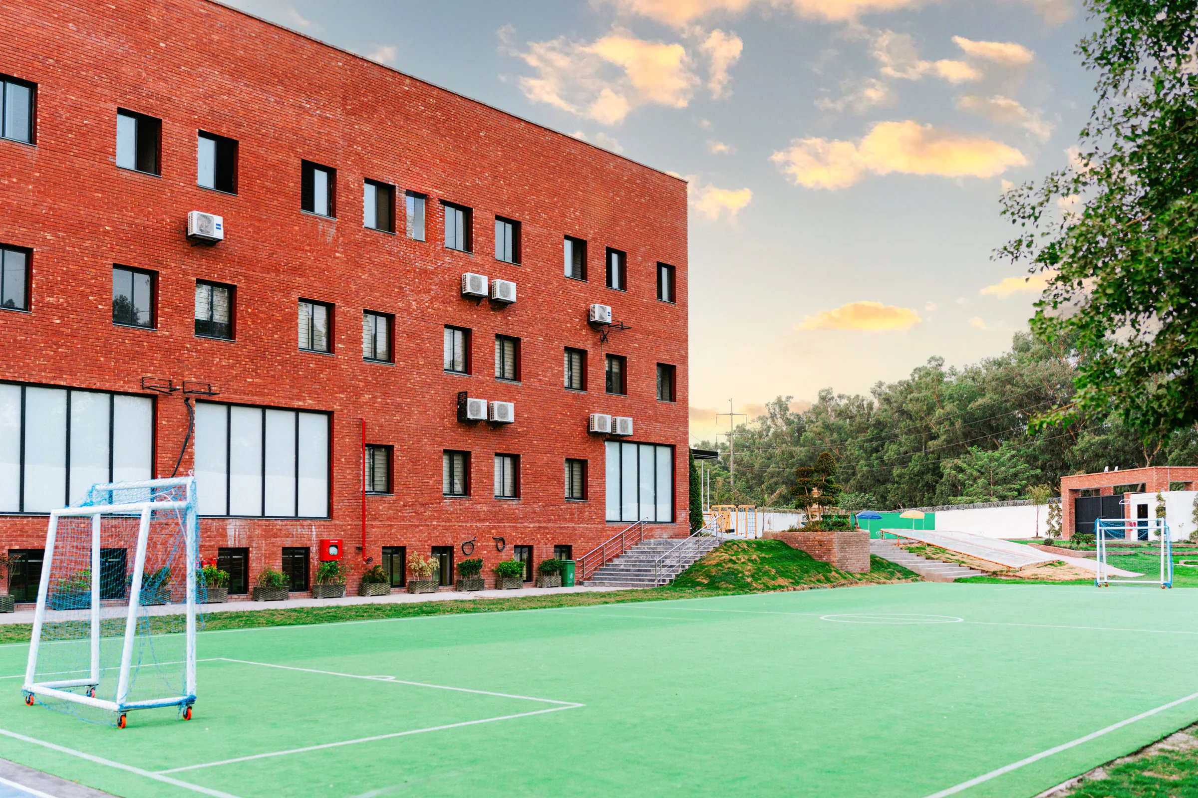 CSI futsal field beside the campus building.