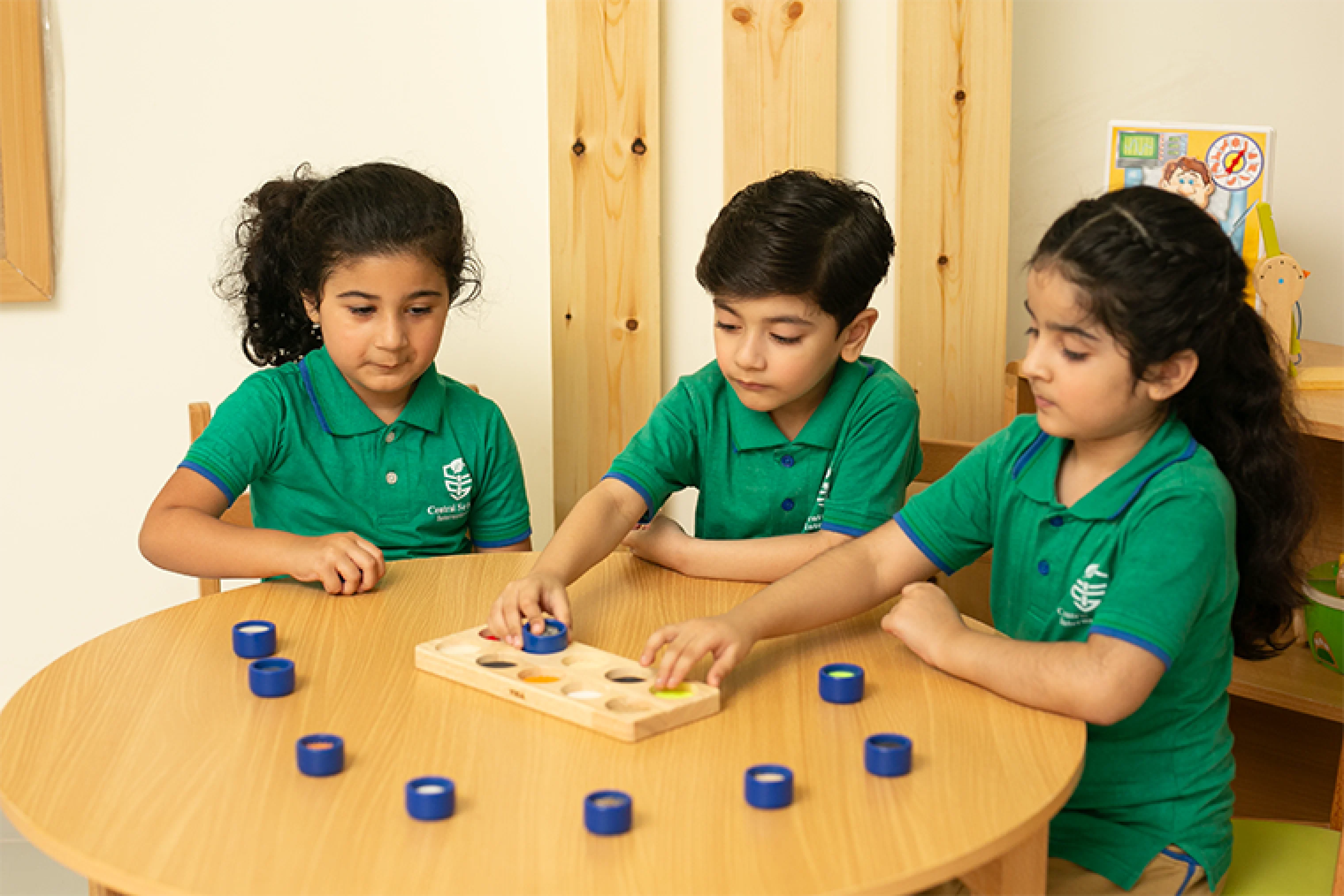 Young CSI learners taking part in a hands-on classroom activity